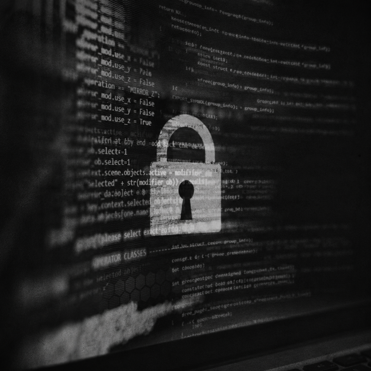 Computer screen showing code and a padlock for secure web development services
